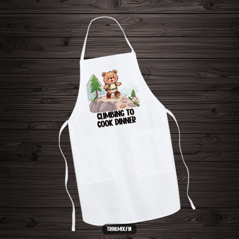 Funny apron illustration: a fuzzy bear wearing hiking boots skipping joyfully up a mountain path while cooking or baking.