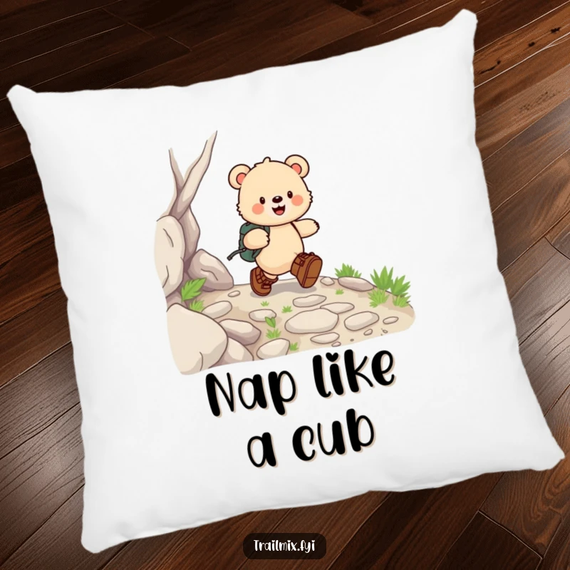 Funny bear cub pillow, depicted happily skipping in hiking boots on a rocky path, offering plush comfort and outdoor charm.