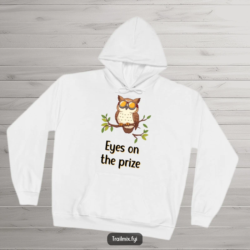 Funny hoodie with a brave owl wearing goggles surveying the trail from a high branch, designed for comfort and exploration.