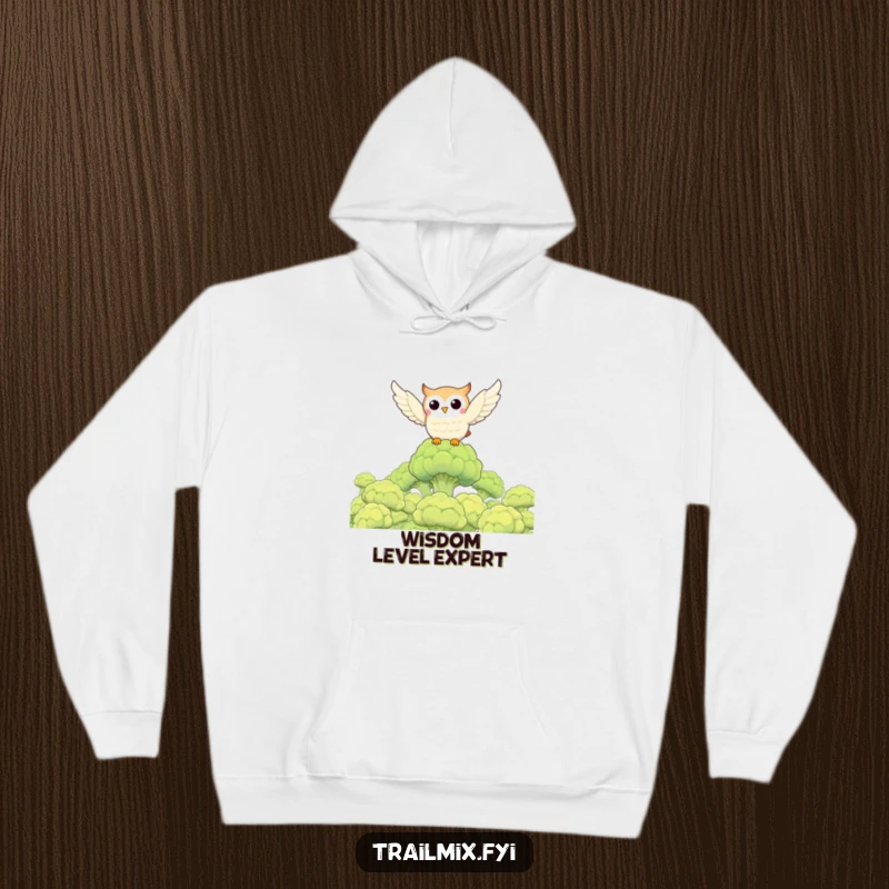Funny owl flying over a broccoli forest on a soft, comfortable hoodie, a delightful and funny gift idea.