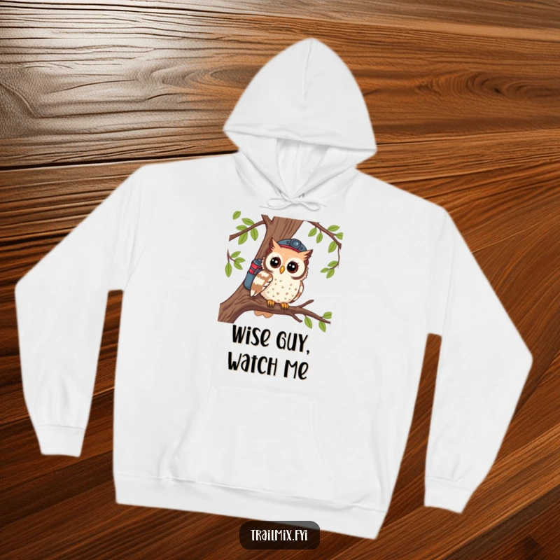 Funny hoodie with a curious owl hiker perched on a branch, observing the surroundings with a sense of wonder.