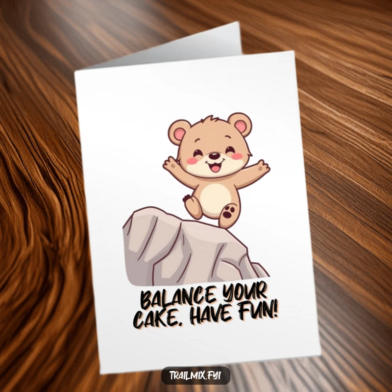 Funny Free Printable birthday card of a happy bear cub balancing on a narrow ridge with pure glee, celebrating joy, downloadable gift.