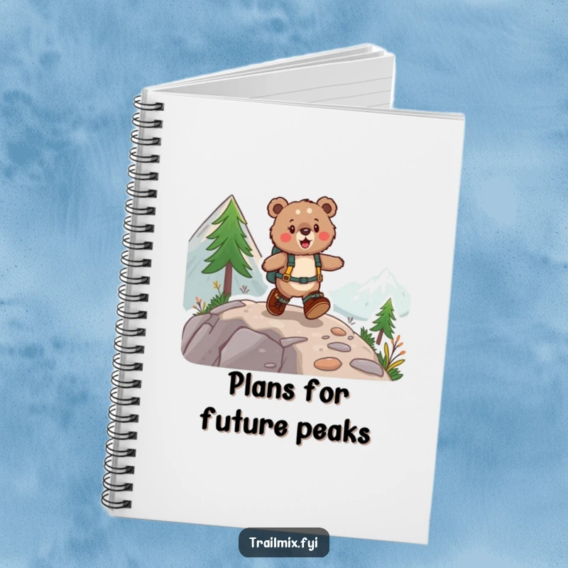 Funny notebook with a cover showing a fuzzy bear in hiking boots joyfully skipping up a mountain path, ready for notes.