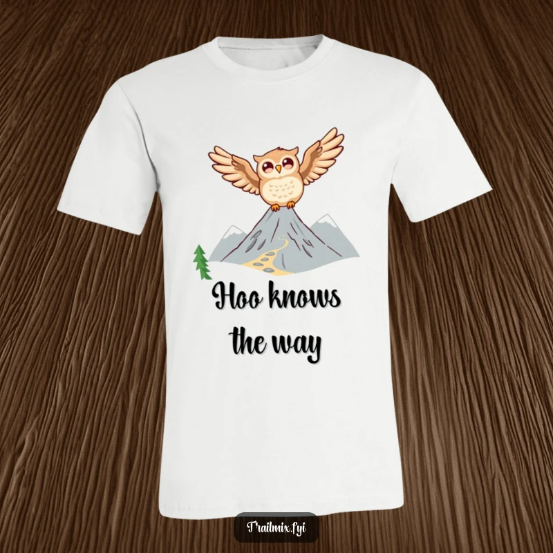 Funny Owl T-Shirt: A happy owl is depicted in mid-flight, soaring majestically above a breathtaking mountain trail.