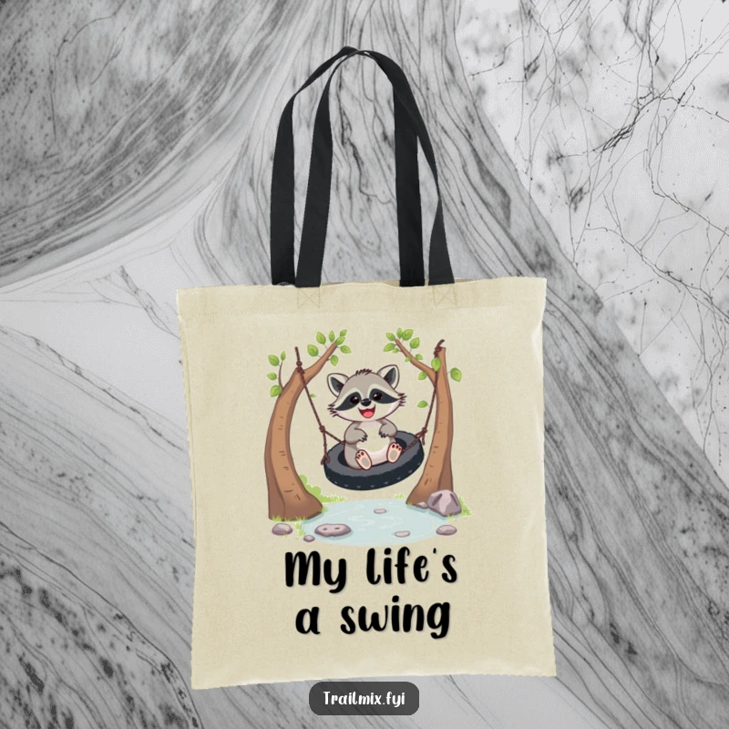 Funny joyful racoon tote bag, swinging happily over a stream. Whimsical and practical accessory for everyday use.