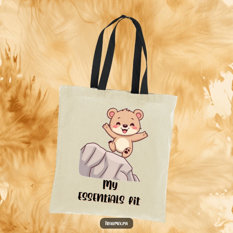 Funny bear cub tote bag, balancing with glee on a ridge, sturdy and spacious, perfect for everyday use.
